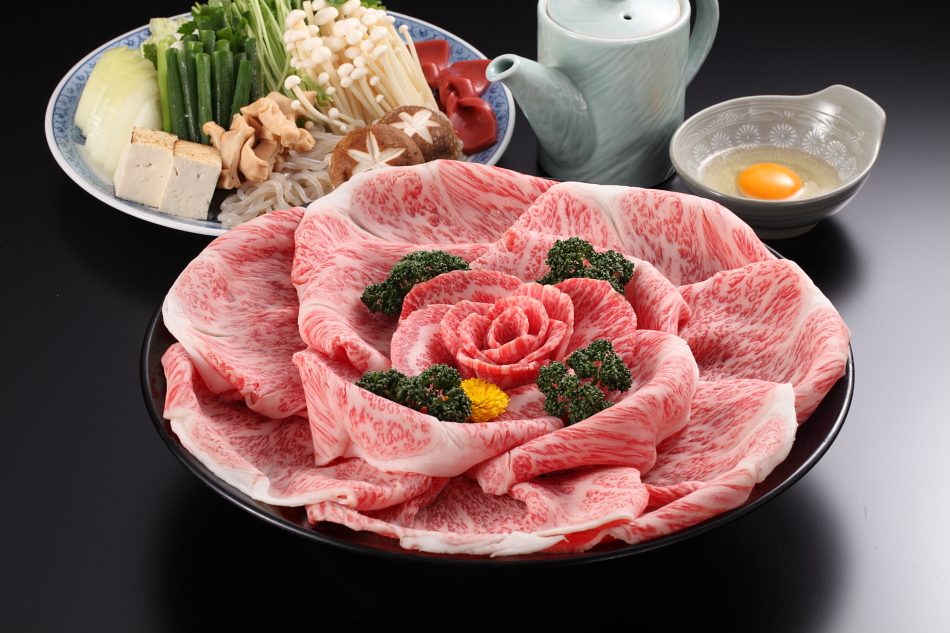 Omi wagyu sukiyaki platter — slices arranged as a rose
